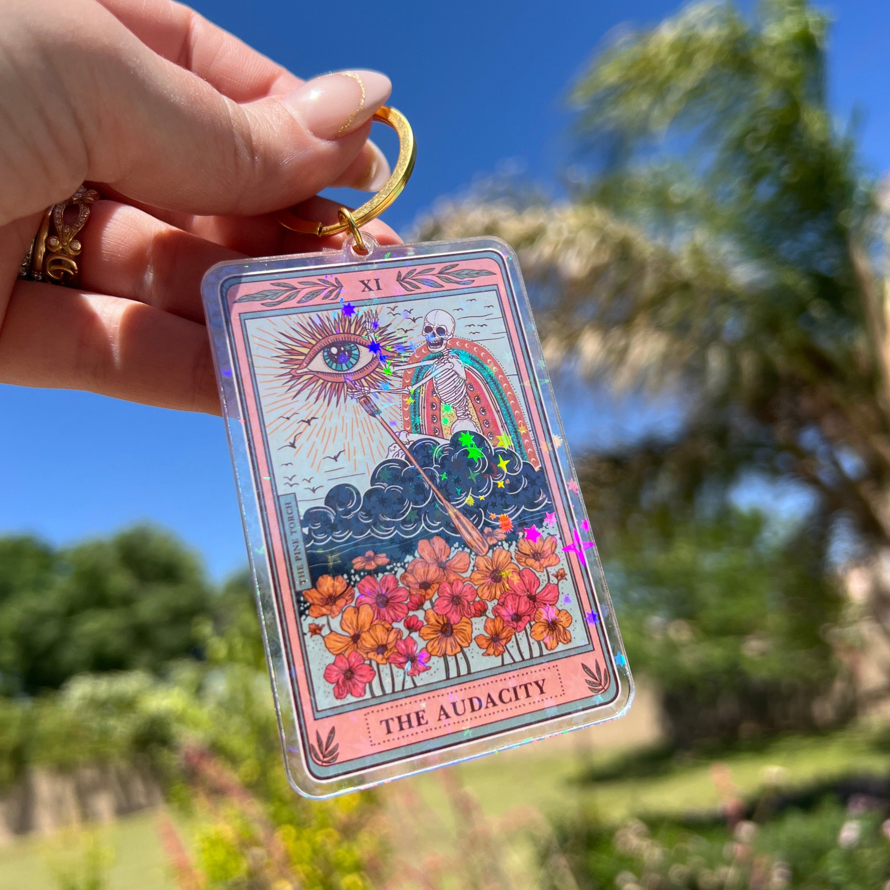 THE AUDACITY « HOLOGRAPHIC KEYCHAIN »