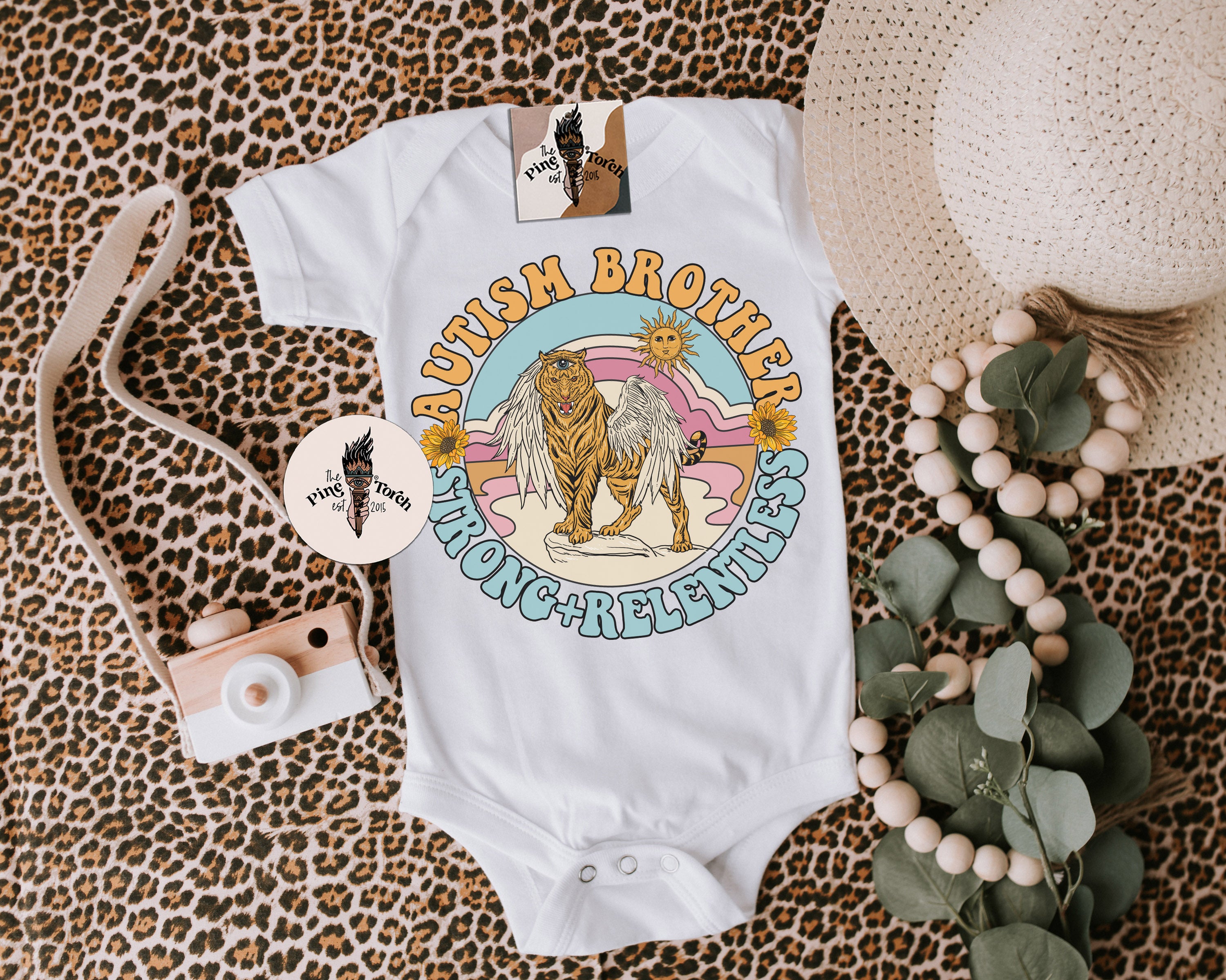 « AUTISM BROTHER - STRONG + RELENTLESS » BODYSUIT