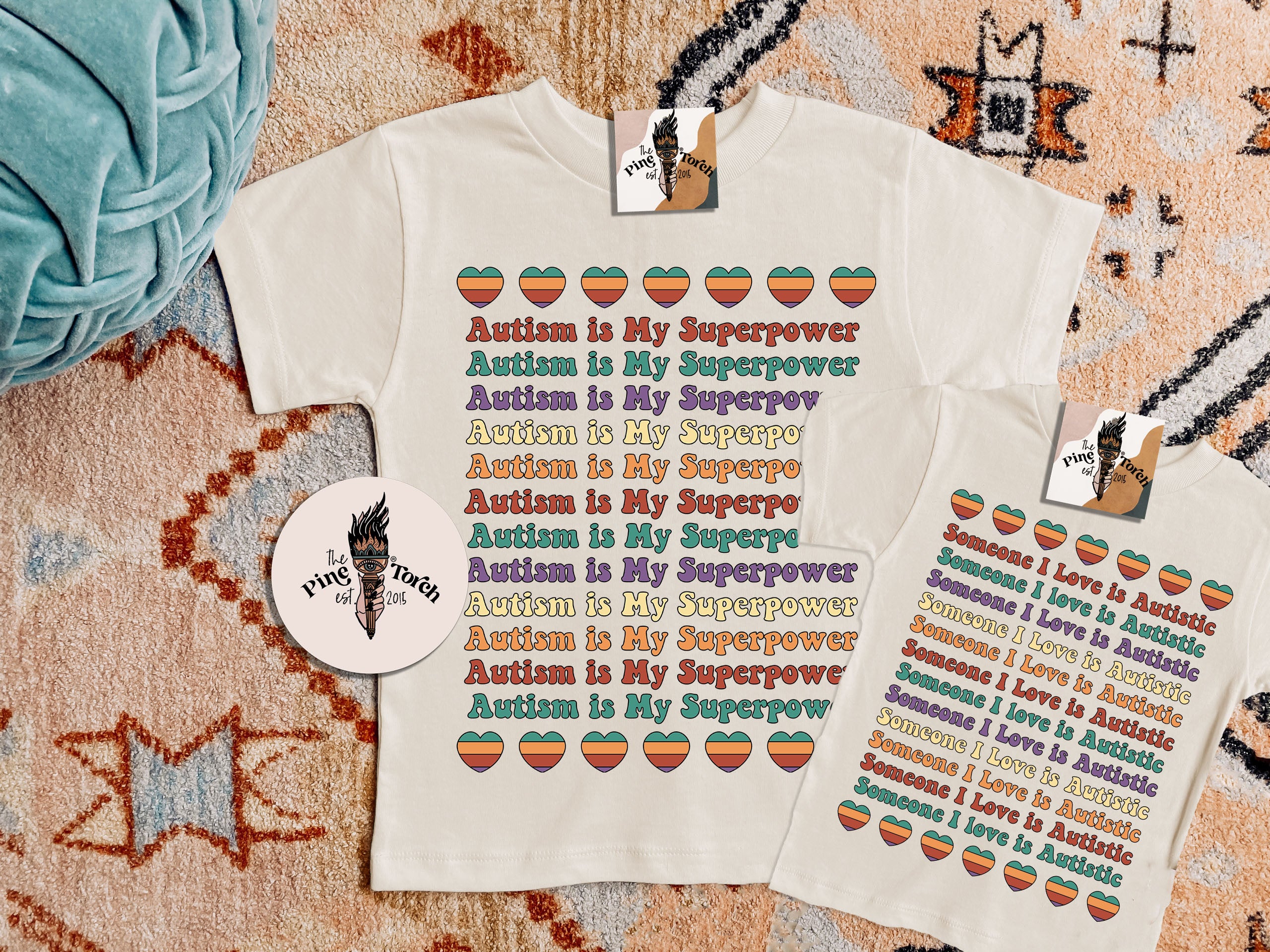 « SOMEBODY I LOVE IS AUTISTIC (RAINBOW) » KIDS/YOUTH TEE