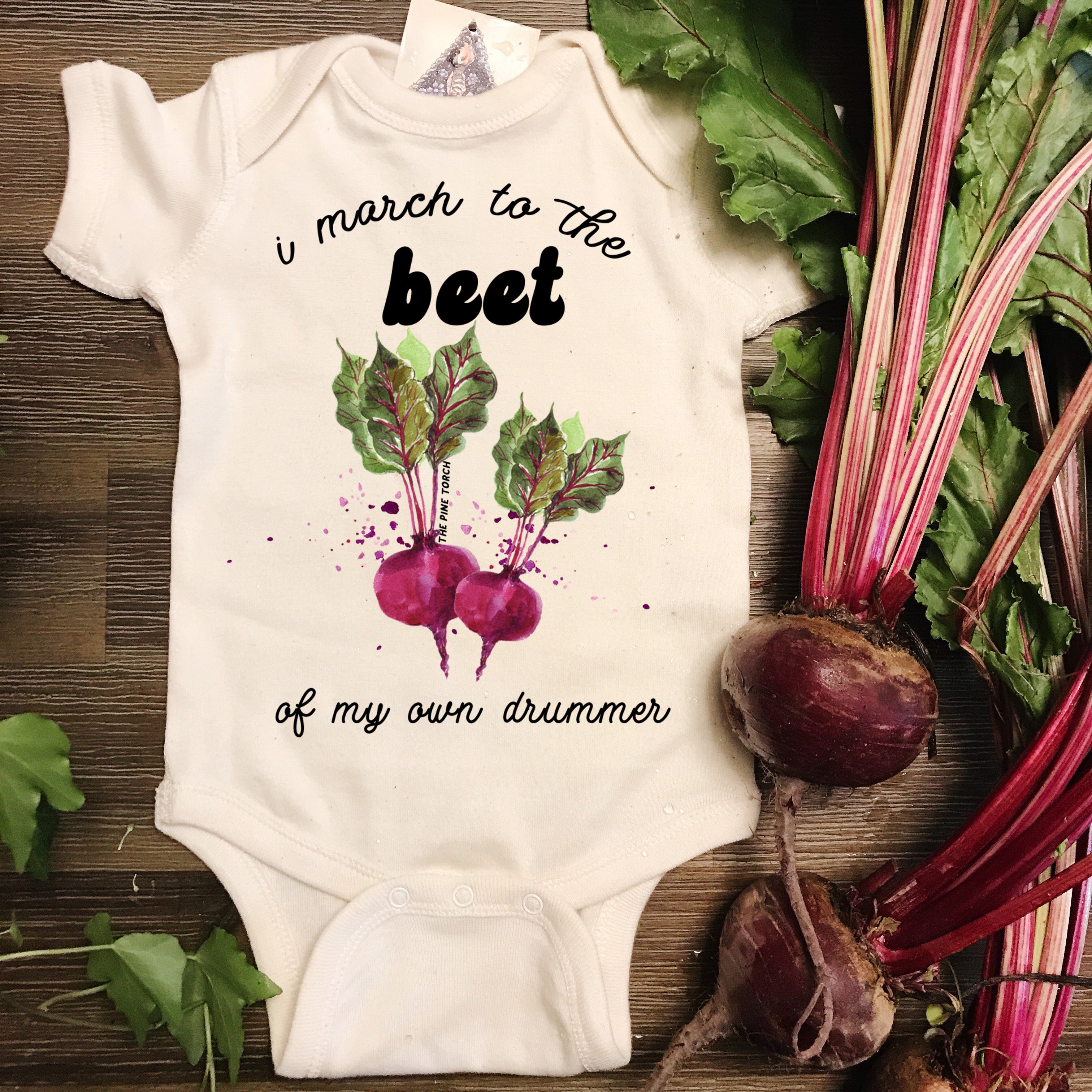 « I MARCH TO THE BEET OF MY OWN DRUMMER » BODYSUIT
