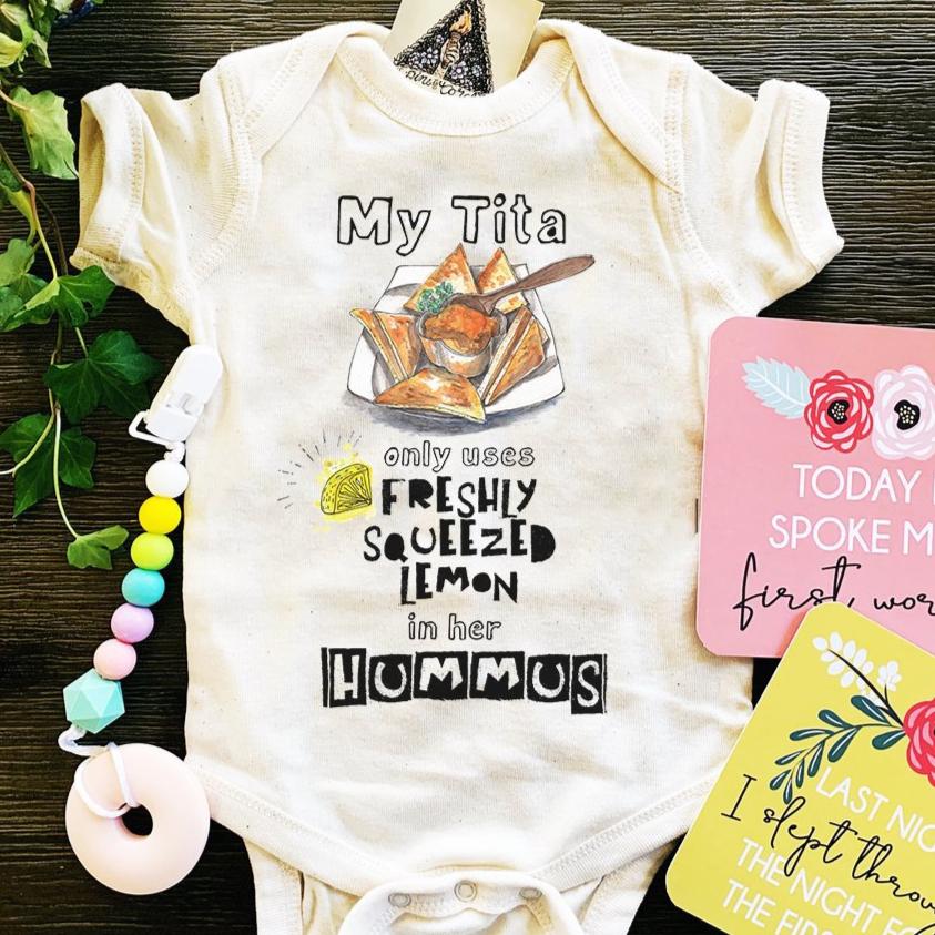 « MY TITA ONLY USES FRESHLY SQUEEZED LEMON ON HER HUMMUS » BODYSUIT