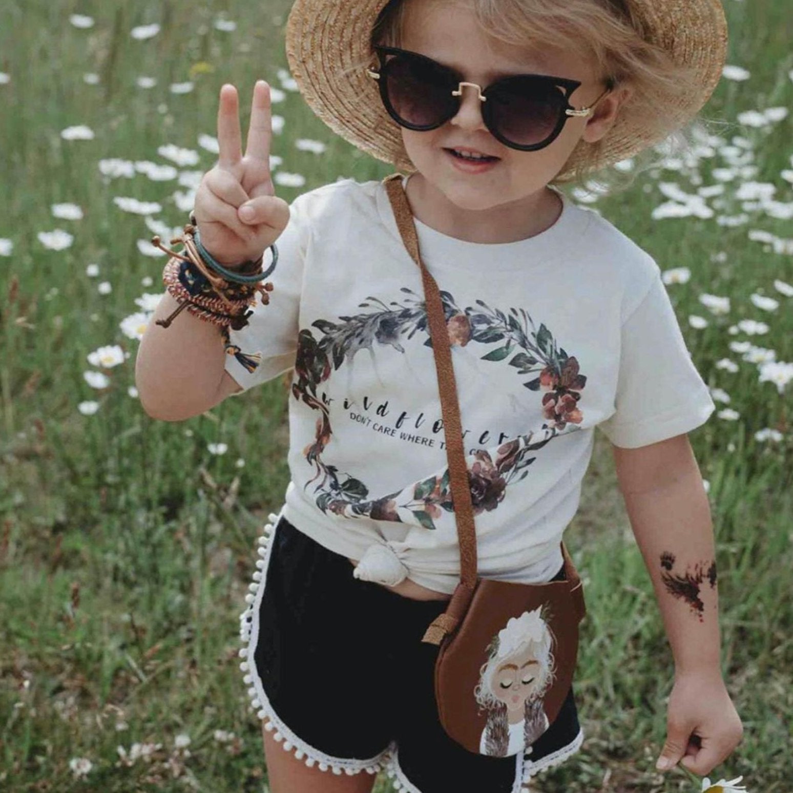 « WILDFLOWERS DON'T CARE WHERE THEY GROW » KIDS TEE