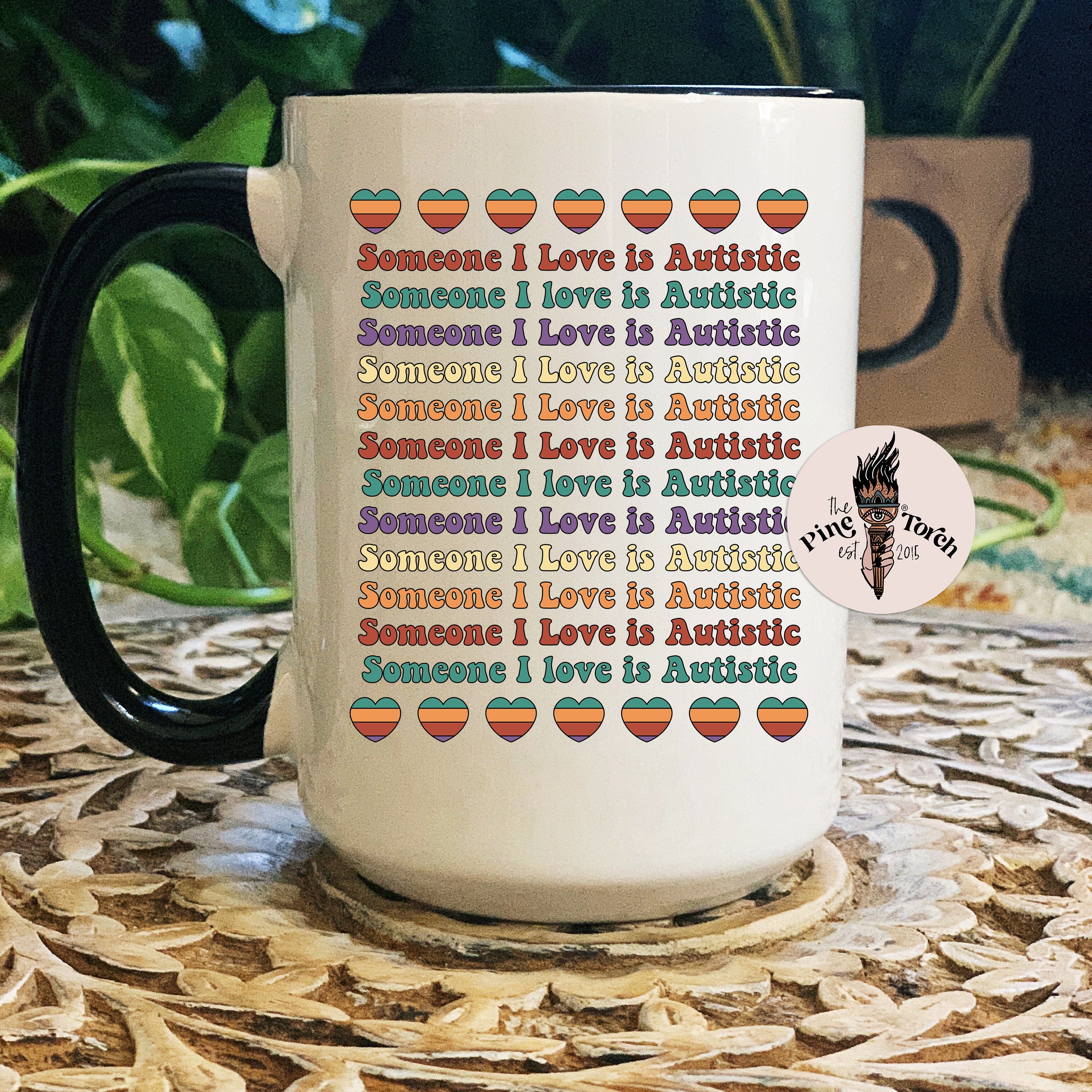 SOMEONE I LOVE IS AUTISTIC *RAINBOW // BLACK RIM MUG