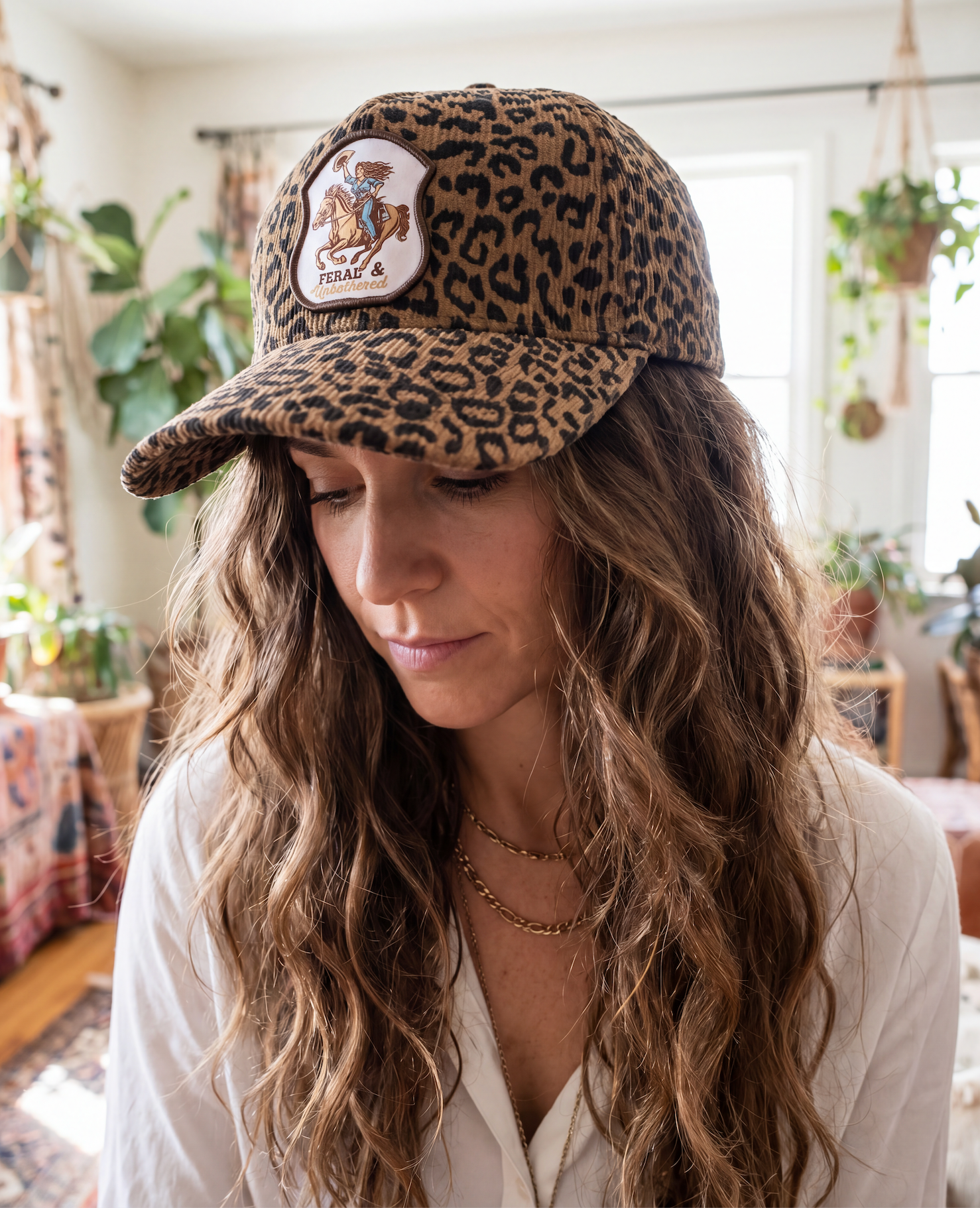 FERAL AND UNBOTHERED // LEOPARD PRINT CUSTOM PATCH TRUCKER HAT