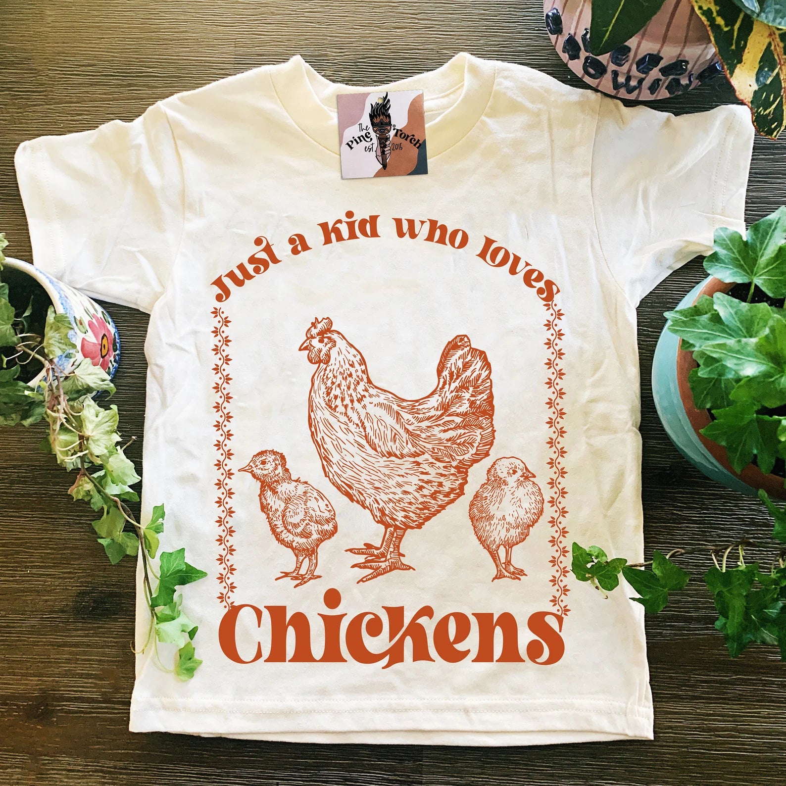 « JUST A KID WHO LOVES CHICKENS » BODYSUIT