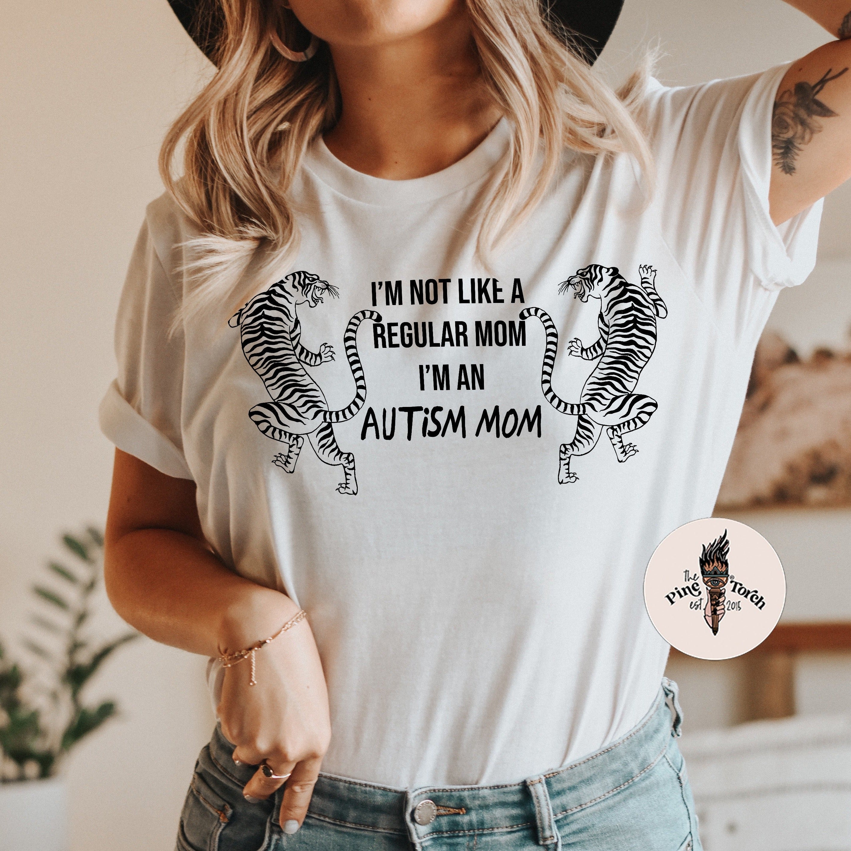 « I'M NOT LIKE A REGULAR MOM I'M AN AUTISM MOM » UNISEX TEE