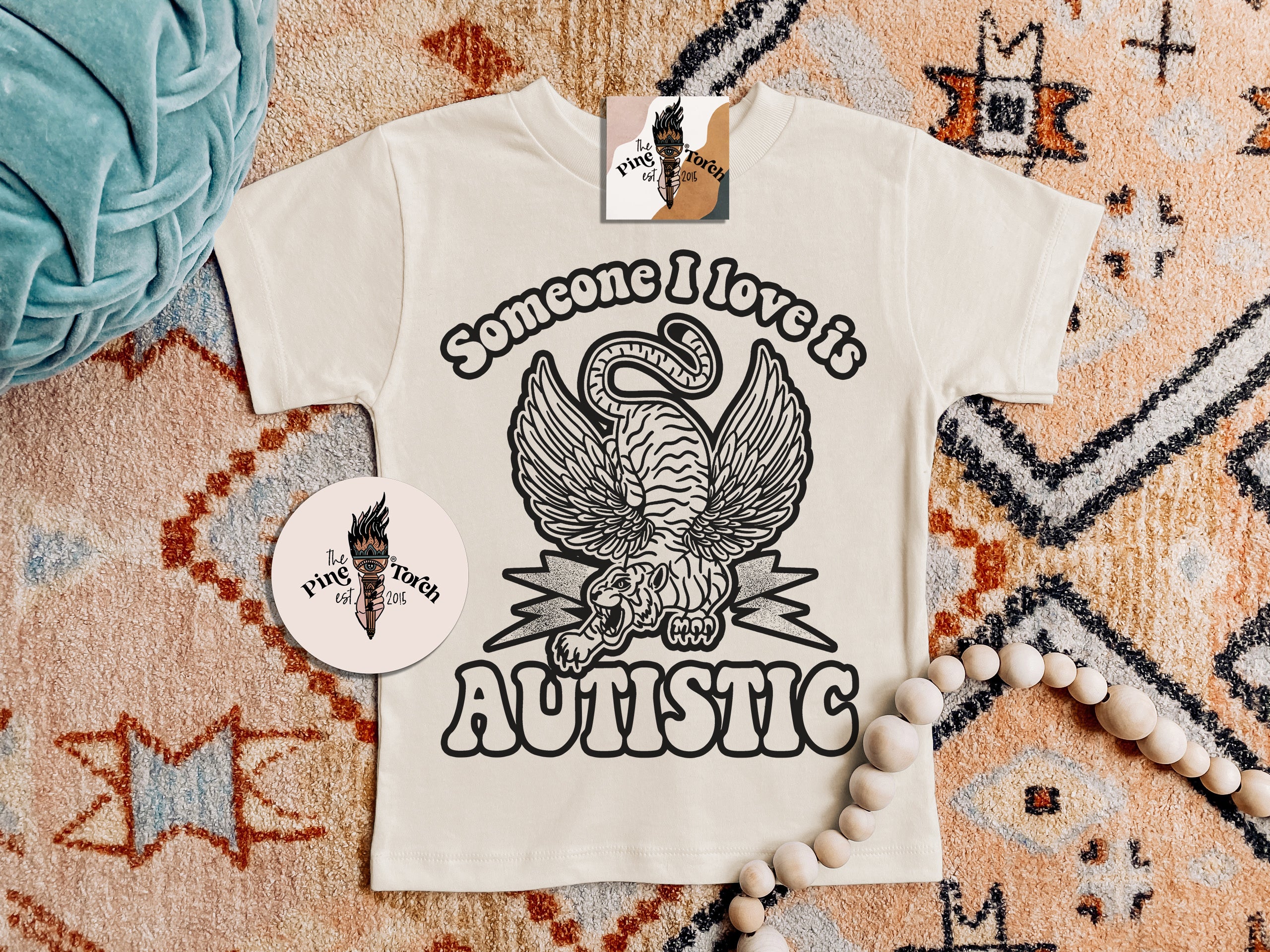 « SOMEBODY I LOVE IS AUTISTIC (TIGER) » KIDS/YOUTH TEE