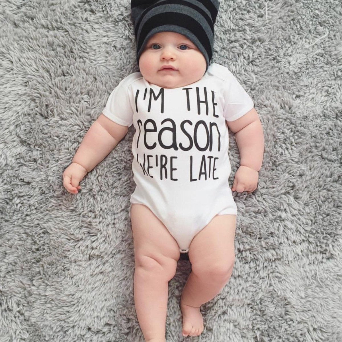 « I'M THE REASON WE'RE LATE » BODYSUIT