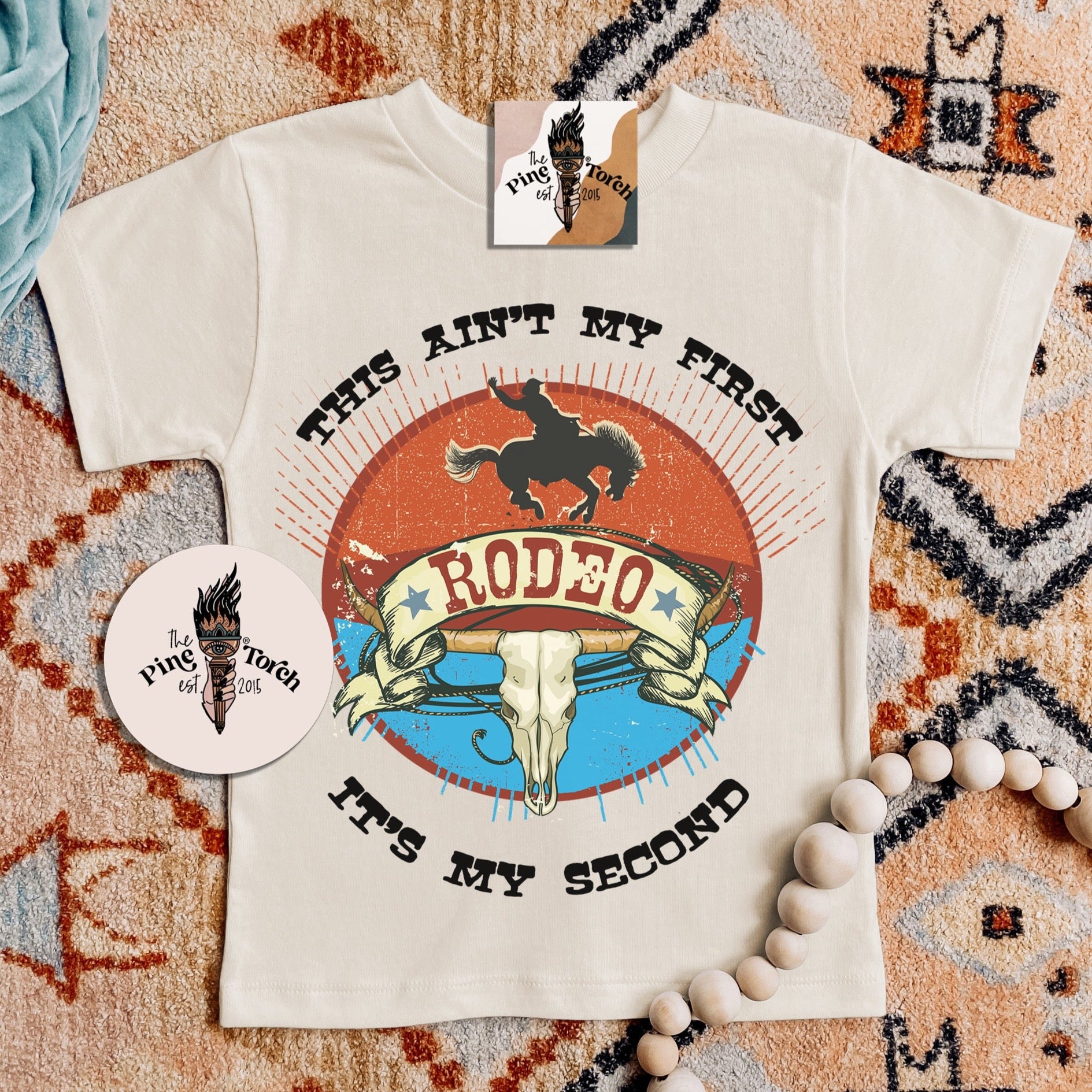 « THIS AIN'T MY FIRST RODEO » KID'S TEE
